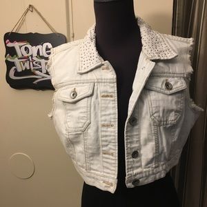 Studded denim crop jacket.